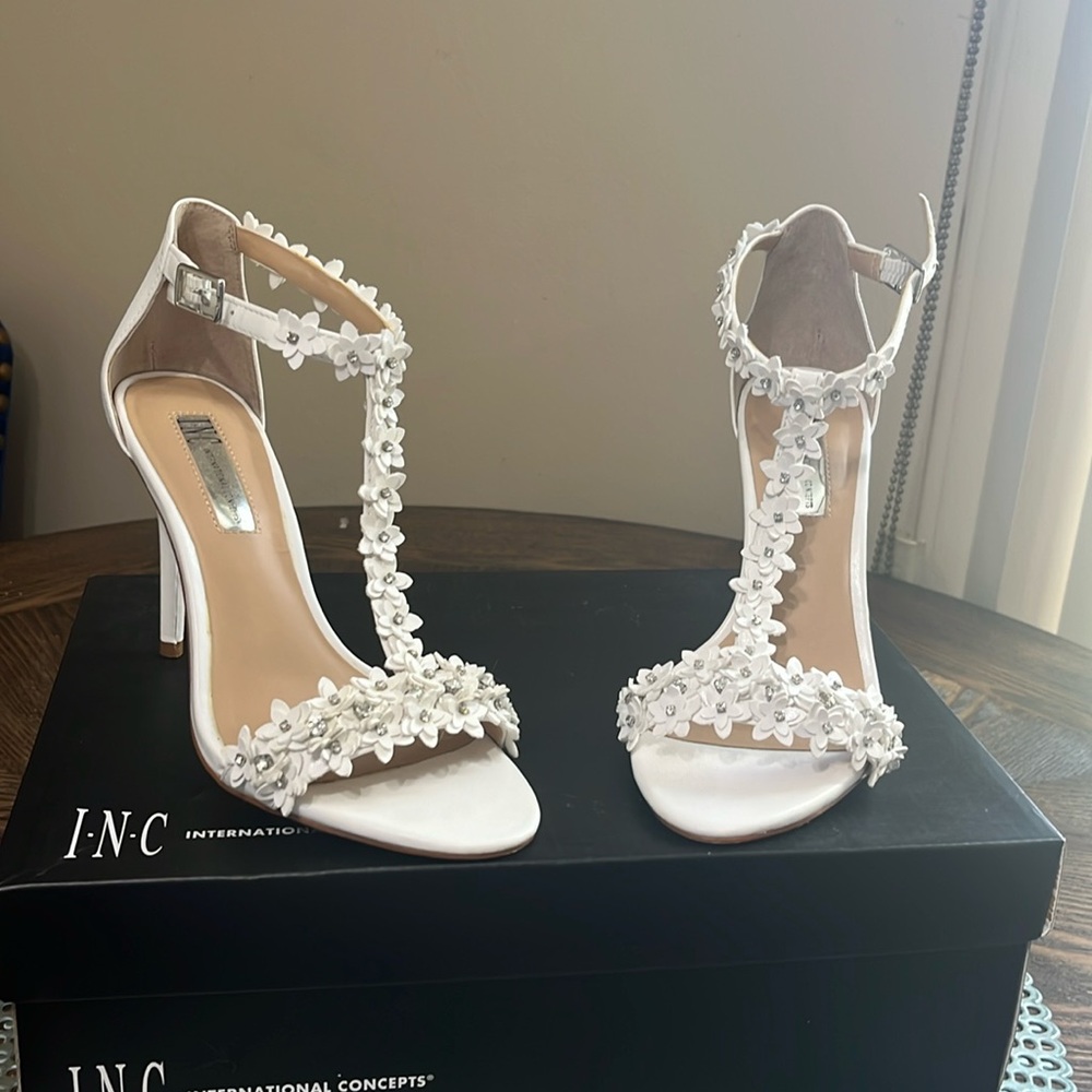 Selling white Summer Sandals with-little  diamonds .